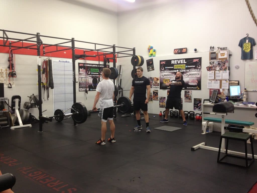 Matt getting coached up on the deadlift by coach Zach