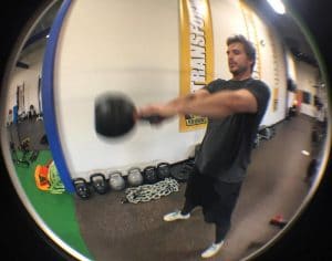 Ryan O'Donnell performing a kettlebell swing