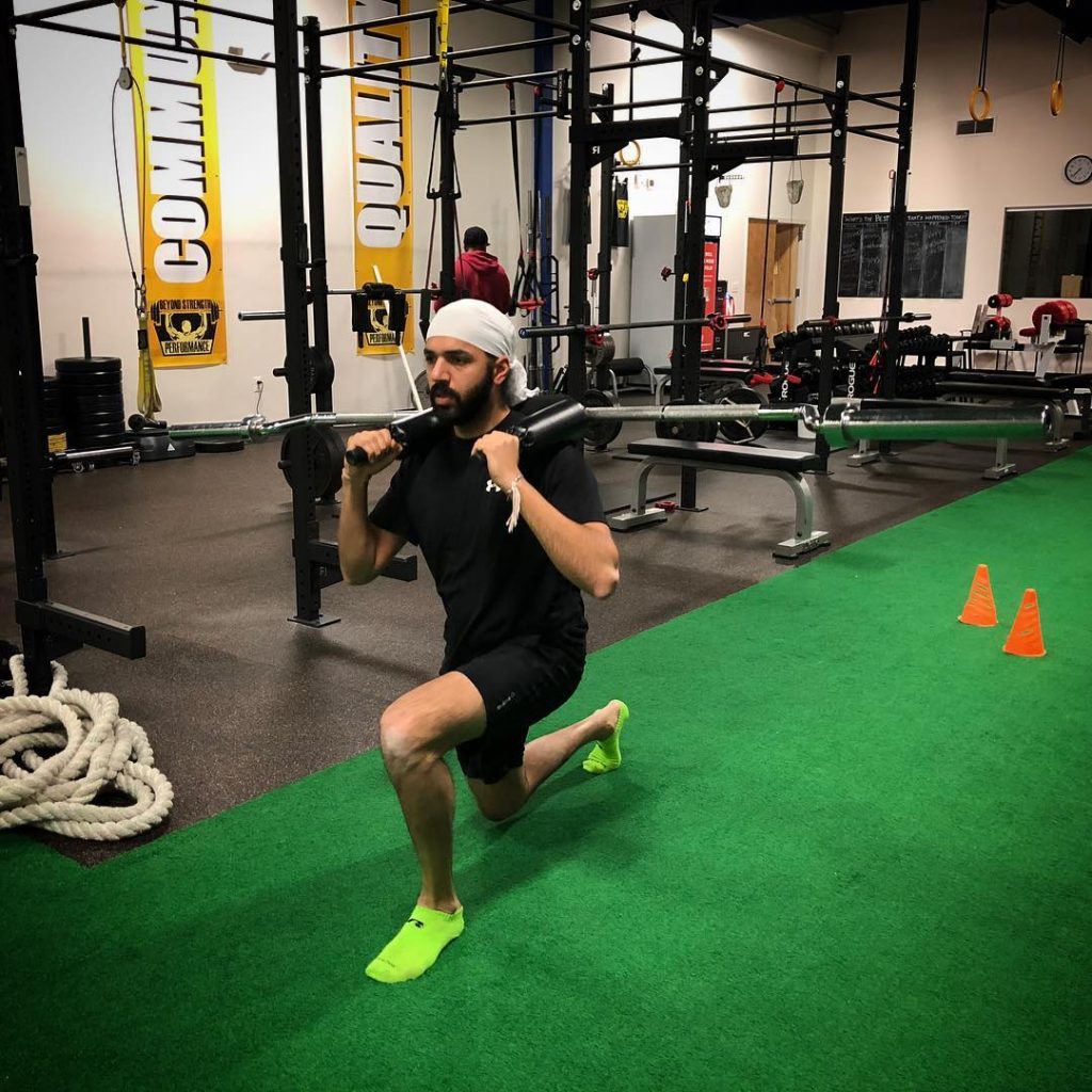 Harry doing walking lunges with a safety bar at BSP NOVA in Sterling, Virginia
