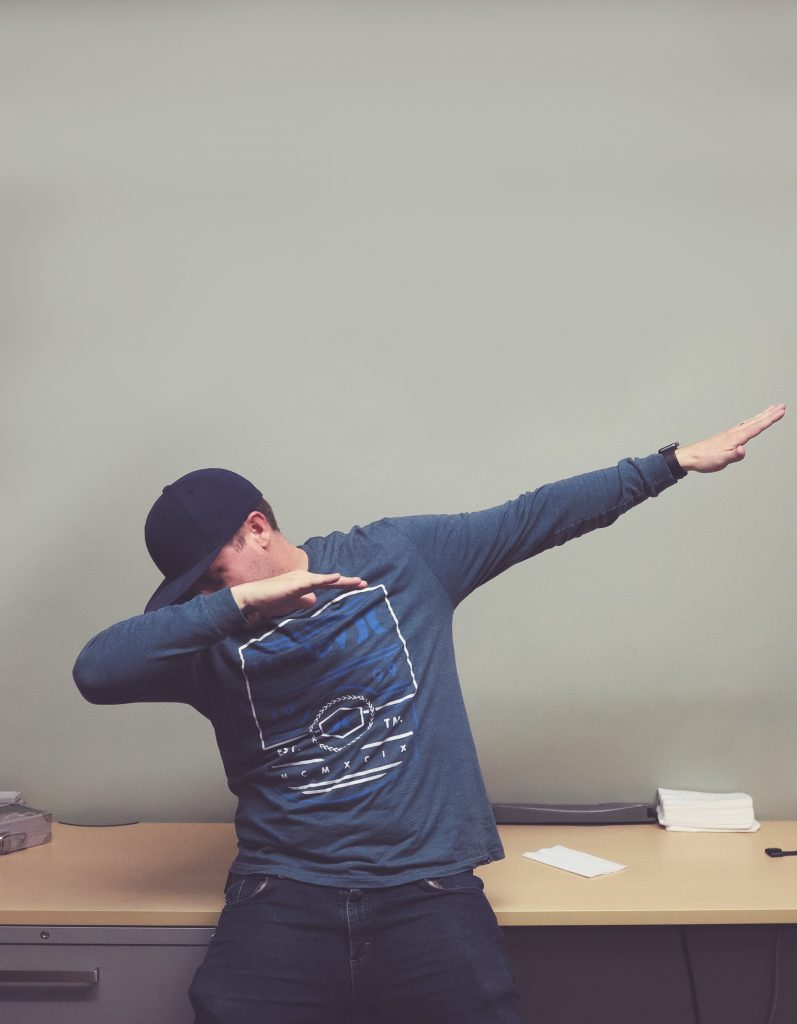 a man celbrating with a dab