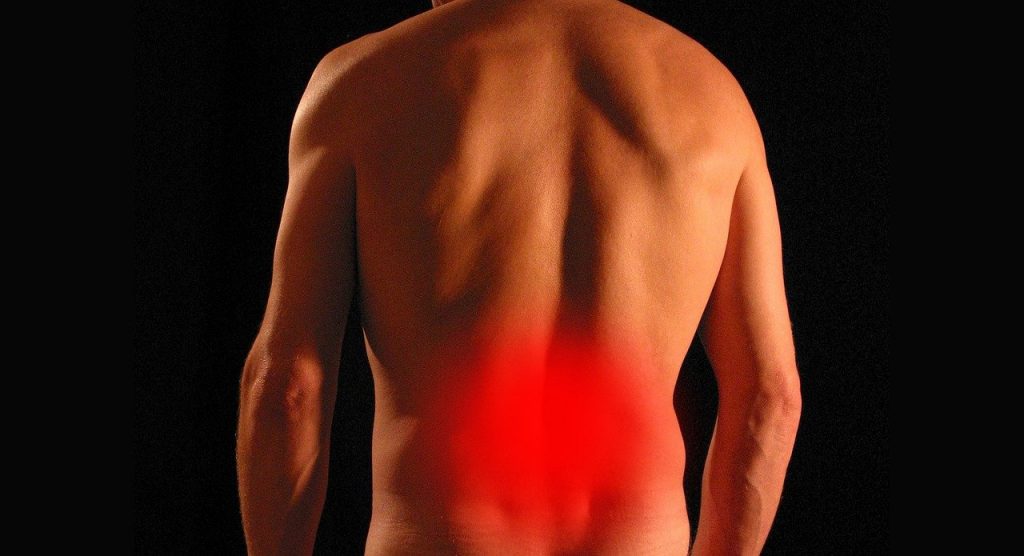 a man experiencing lower back pain