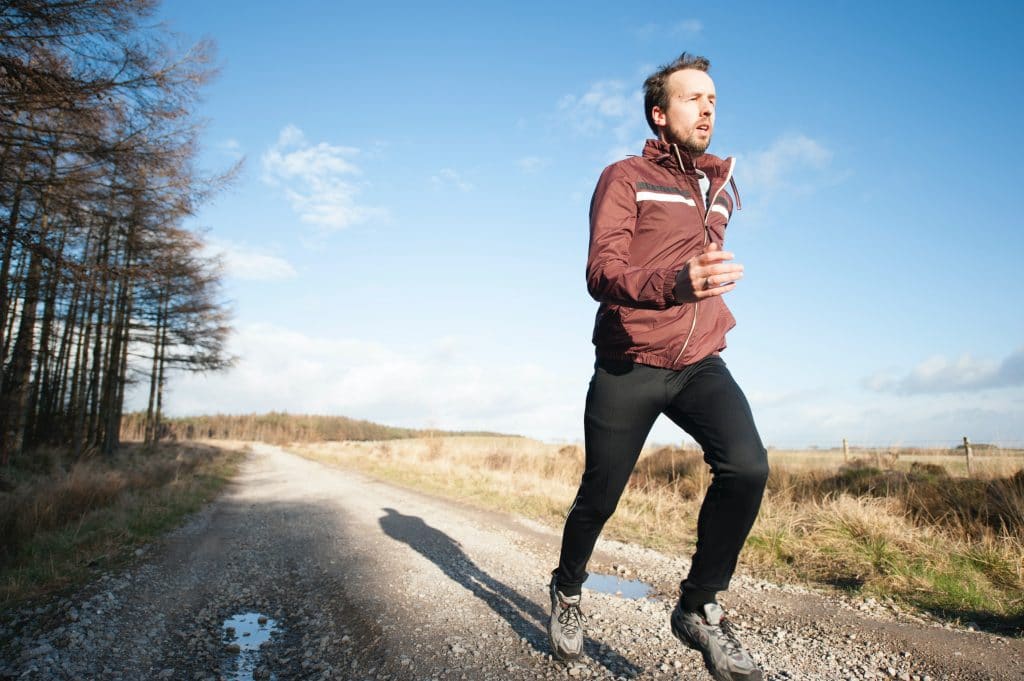 a man running outside for cardio