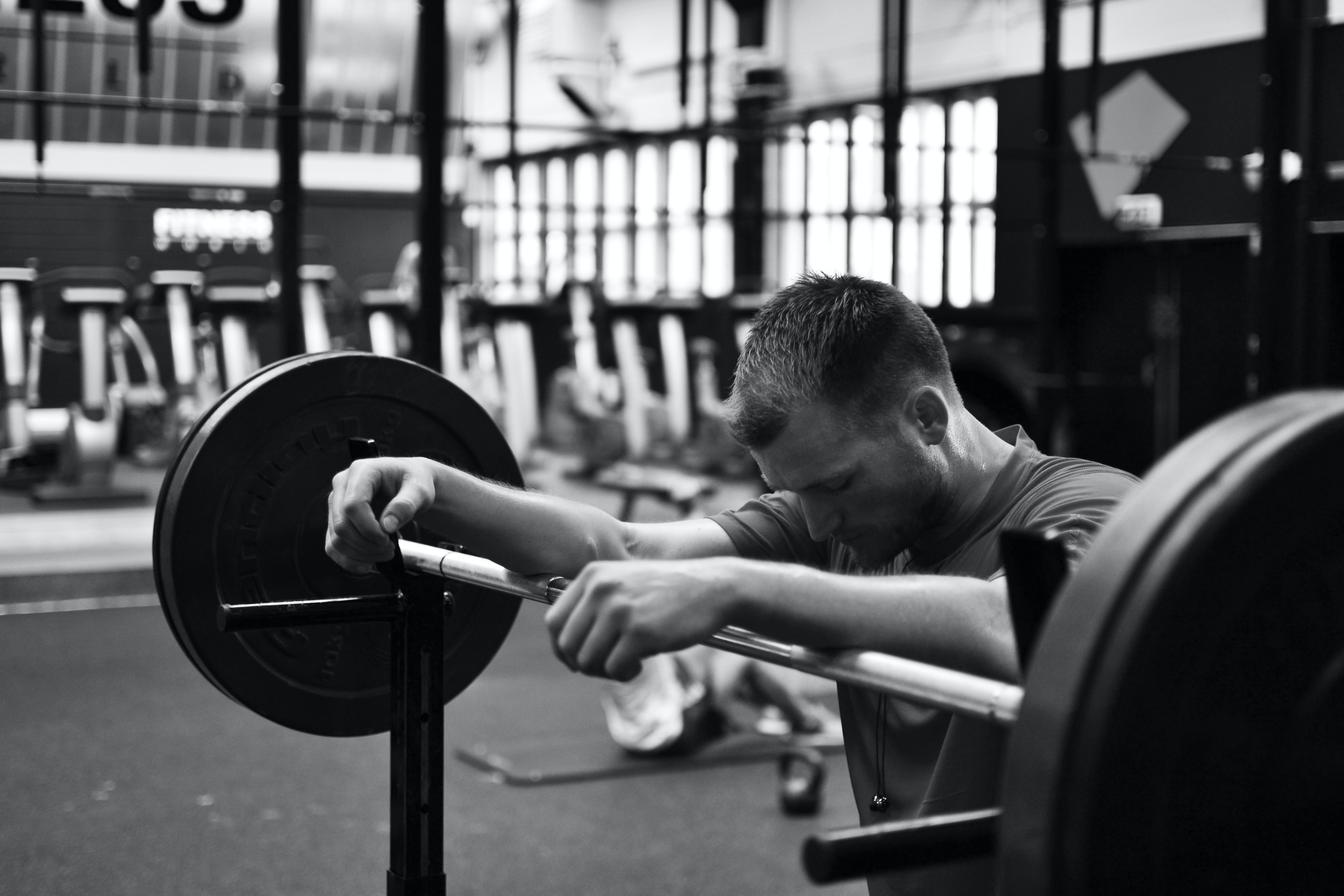 Chet racking the barbell after a frustrating set of squats