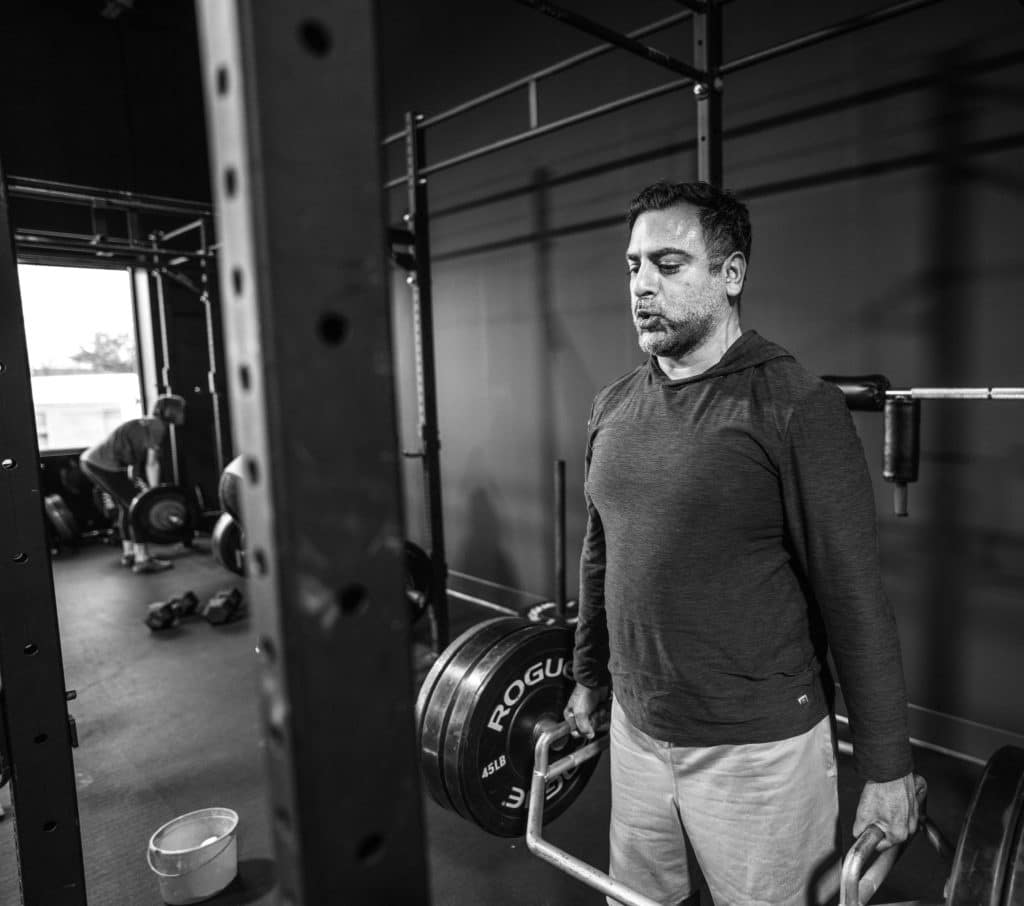Anuj performing a deadlift as part of his program at Beyond Strength in Sterling, Virginia