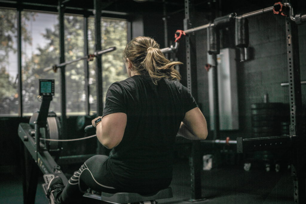 Lauren rowing in Endurance class at Beyond Strength in Sterling, Virginia