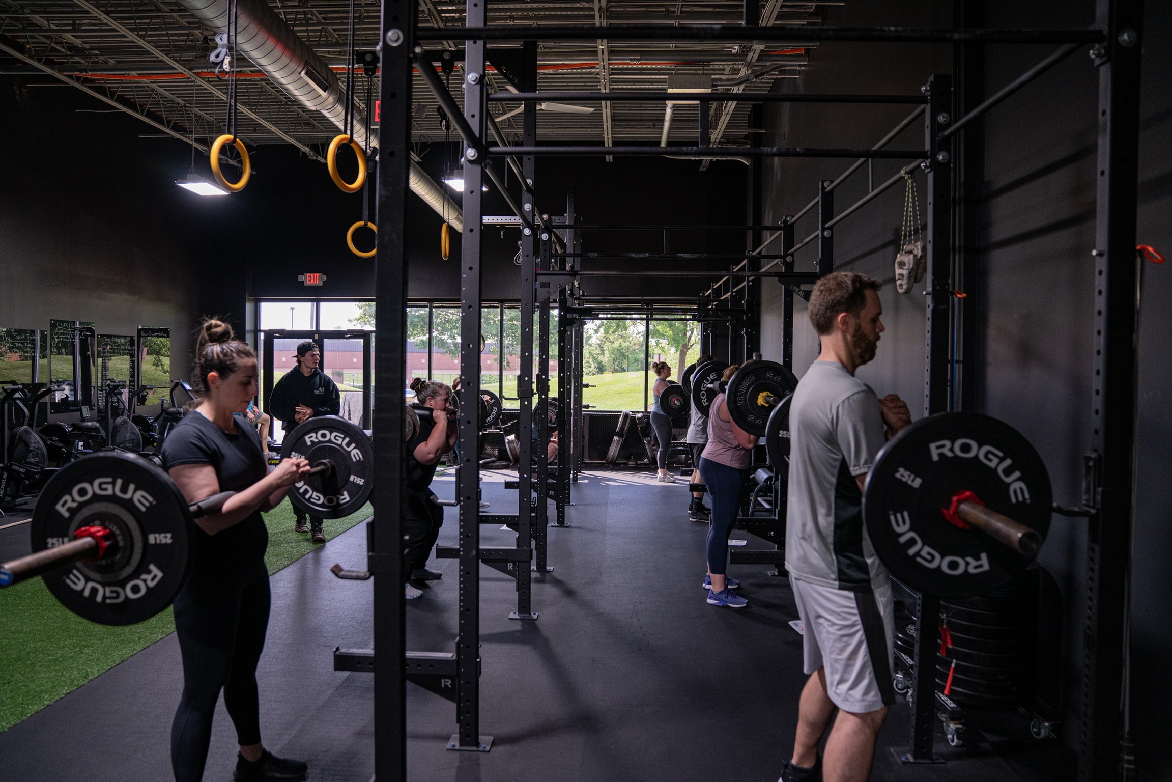 Folks squatting at Beyond Strength in Sterling, Virginia
