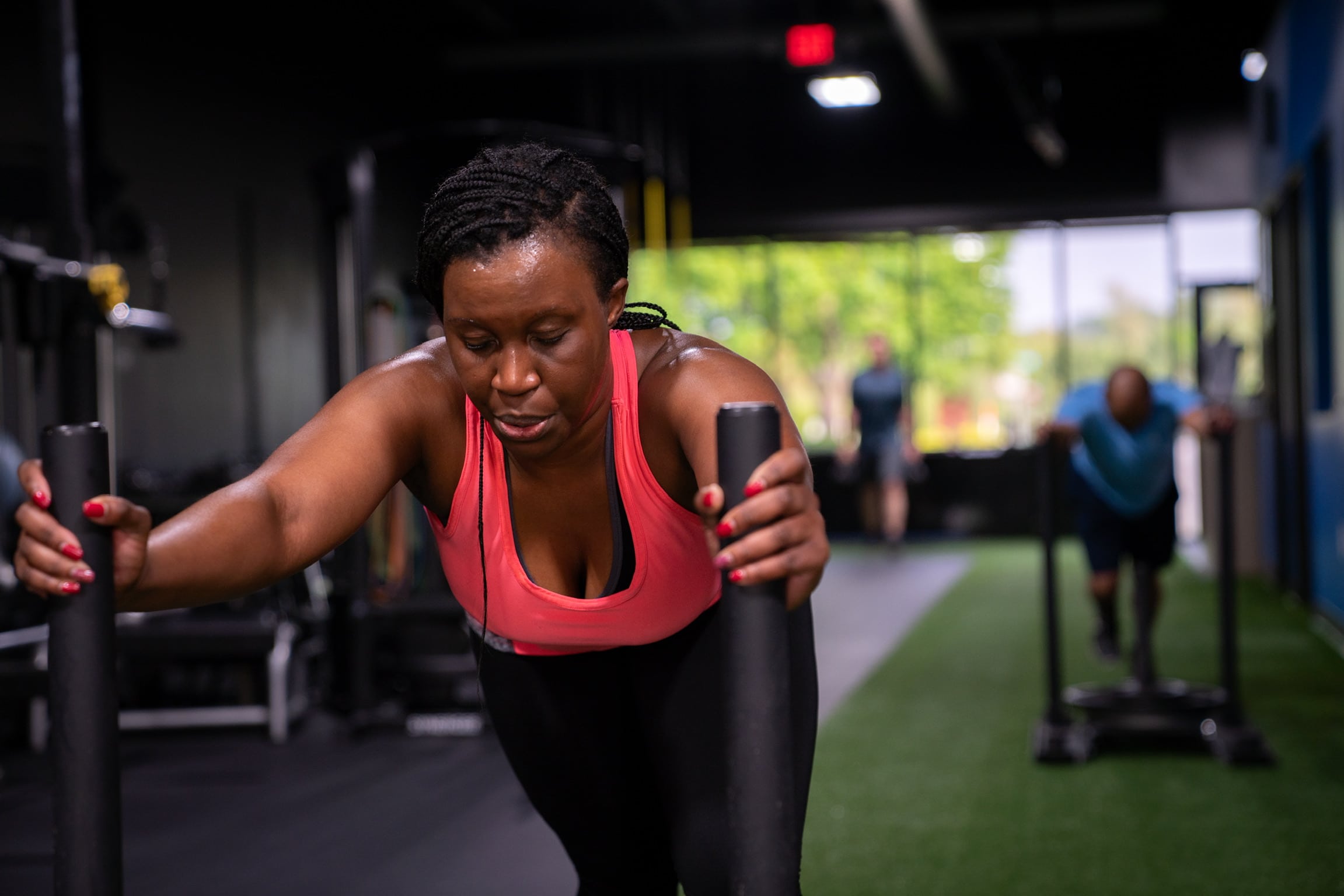 Aniesha working through a tough fitness challenge at Beyond Strength in Sterling, VA