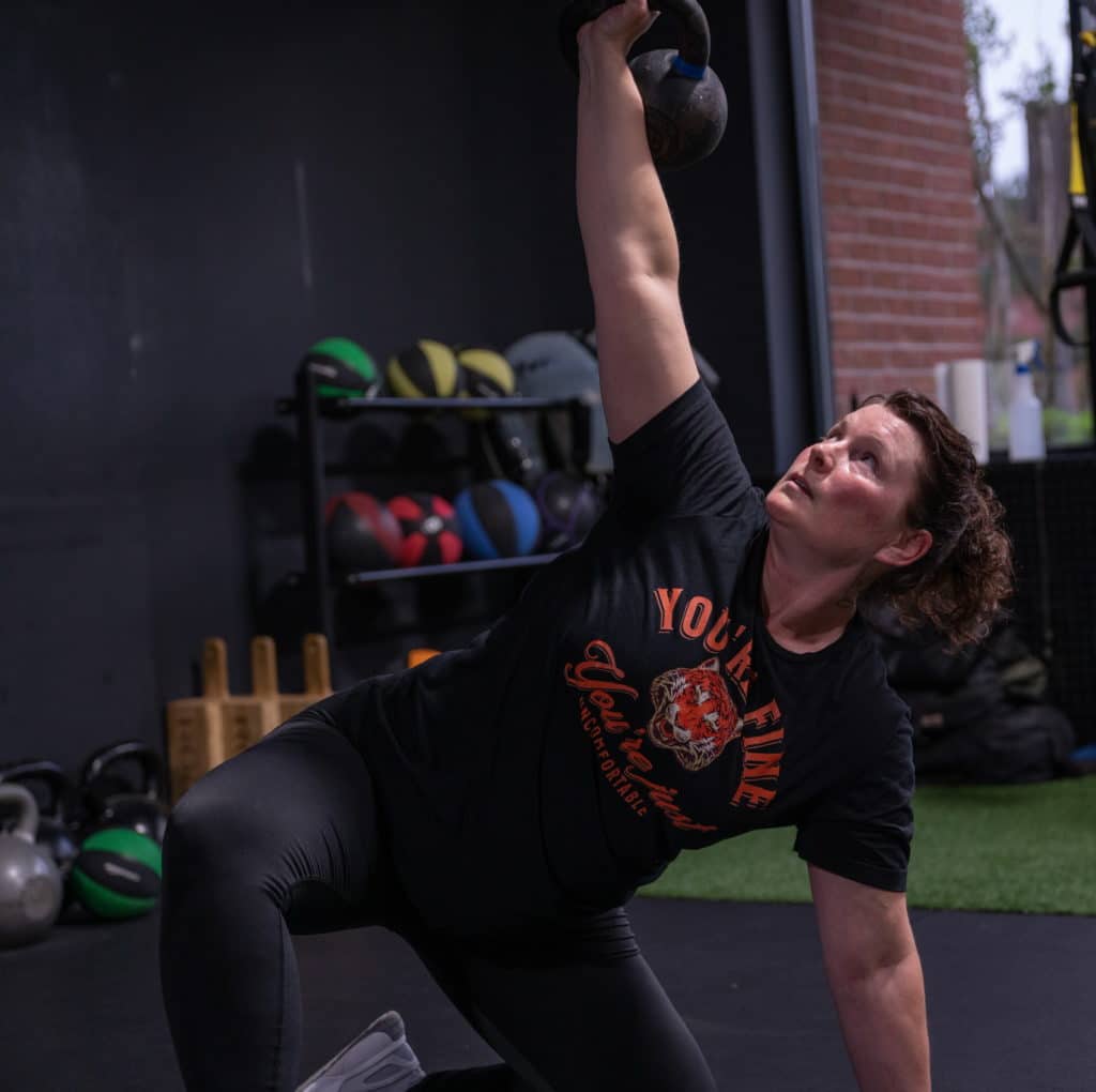 Michelle doing a get-up at Beyond Strength in Sterling, Virginia