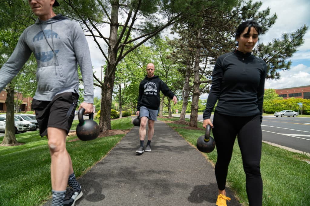 Performing the kettlebell mile at Beyond Strength in Sterling, Virginia