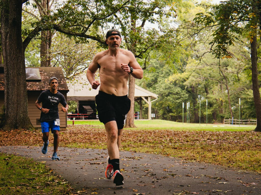 Brad running at the Run Carry Ruck race in Sterling, Virginia after doing lots of zone 2 running to prepare.